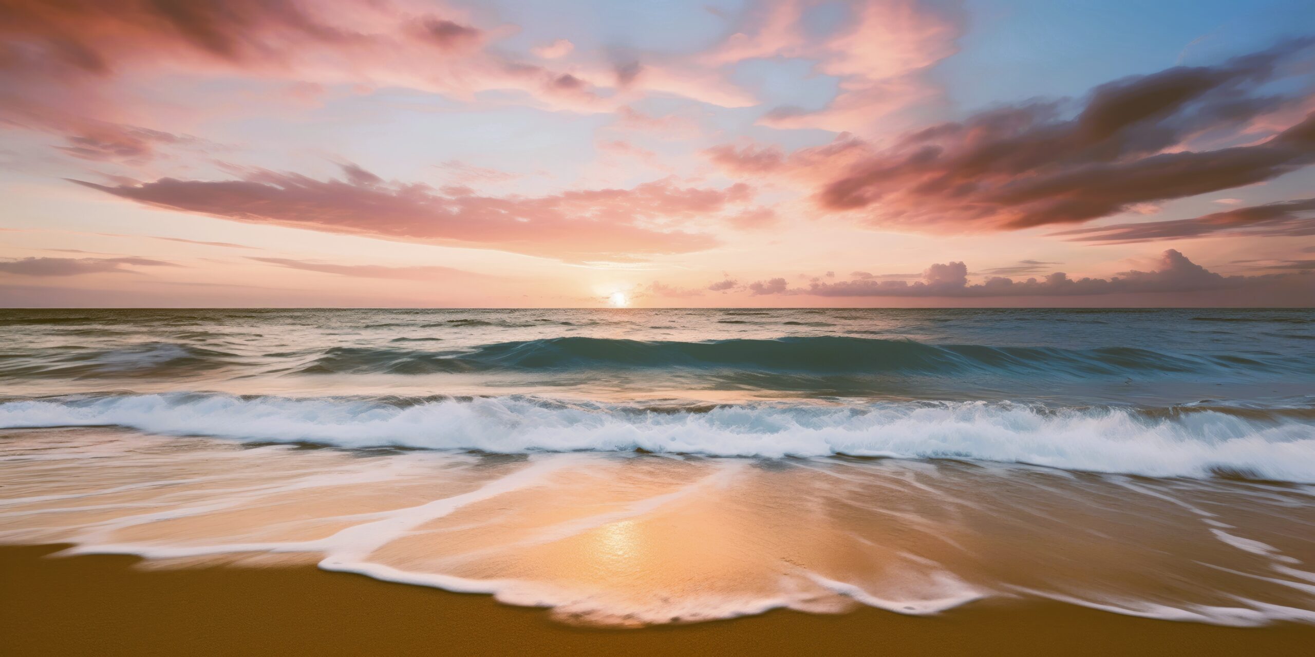 Glorious sunset sky as a backdrop to a tranquil beach.